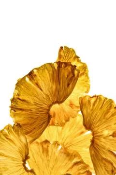 Pattern from dried pineapples. Chips. Natural snack. Stock Photos