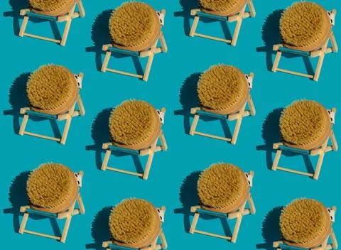 Pattern of Dry massage brush on beach chair with natural bristle, ecological Stock Photos