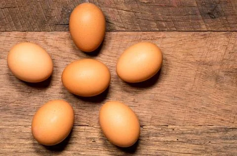 Pattern of eggs on rustic wooden table for Easter Easter background with b... Stock Photos