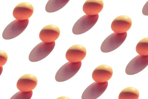 Pattern of eggs on white isolated background top view of Flat lay Stock Photos