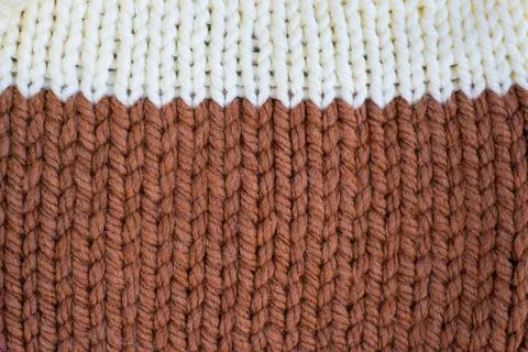 Pattern fabric made of wool. Handmade knitted fabric Stock Photos