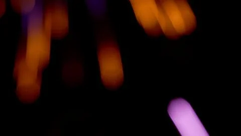 Pattern of fireworks in the evening sky Stock Photos