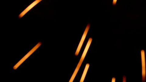 Pattern of fireworks in the evening sky Stock Photos