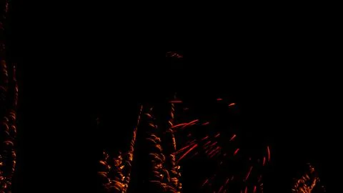 Pattern of fireworks in the evening sky Stock Photos