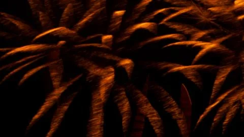 Pattern of fireworks in the evening sky Stock Photos