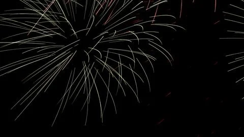 Pattern of fireworks in the evening sky Stock Photos