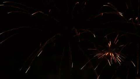 Pattern of fireworks in the evening sky Stock Photos