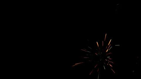 Pattern of fireworks in the evening sky Stock Photos