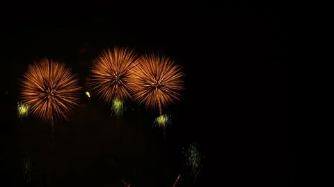 Pattern of fireworks in the evening sky Stock Photos