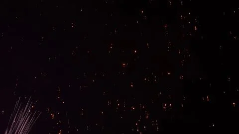 Pattern of fireworks in the evening sky Stock Photos