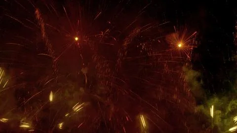 Pattern of fireworks in the evening sky Stock Photos