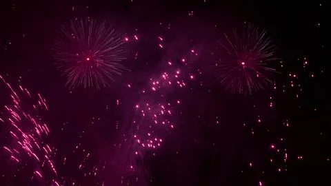 Pattern of fireworks in the evening sky Stock Photos