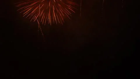 Pattern of fireworks in the evening sky Stock Photos