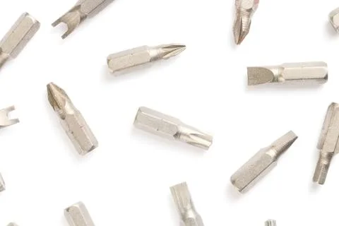 Pattern, flat lay screwdriver bit set close-up, white background. Stock Photos
