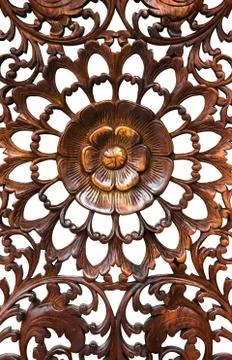 Pattern of flower carved on wood isolate background Stock Photos
