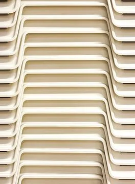 Pattern formed by plastic boxes stacked on one another Stock Photos