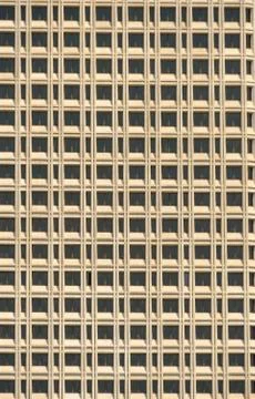 Pattern formed by the windows of an office building 写真素材
