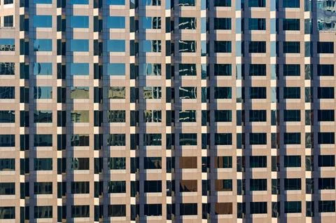 Pattern formed by the windows on an office building in Austin, Texas Stock Photos