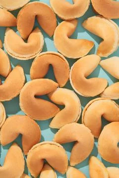 Pattern with fortune cookies on blue background with deep long shadows Stock Photos