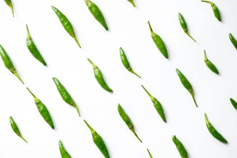 Pattern of fresh green bird's eye chilies or cabe rawit hijau Stock Photos