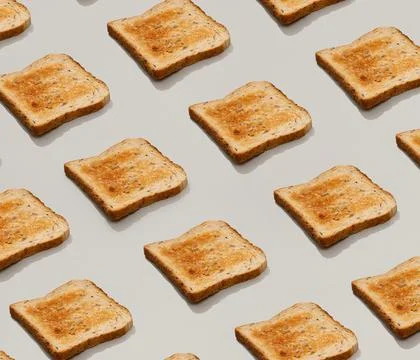 Pattern with fresh toasted bread on gray background flat lay top view Stock Photos