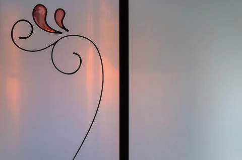 Pattern on the front door glass Stock Photos