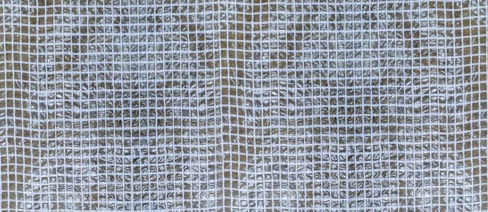 Pattern geometric plastic with square honeycombs background polyethylene mate Fotos de archivo