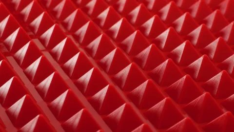 Pattern of geometric shapes in the form of a red pyramids. 動画素材 255355506