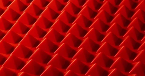 Pattern of geometric shapes in the form of a red pyramids. 動画素材 255361377