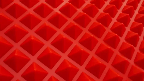 Pattern of geometric shapes in the form of a red pyramids. 動画素材 256208788