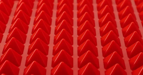 Pattern of geometric shapes in the form of a red pyramids. 動画素材 257694342