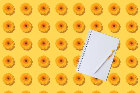 A pattern of gerbera flowers on a yellow Stock Photos