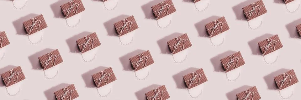Pattern of gift boxes on pink background. Creative design for packaging. Top Stock Photos