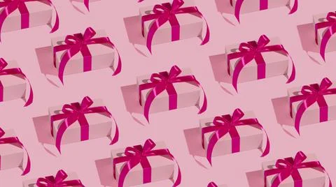 Pattern of gift boxes on pink background Stock Photos