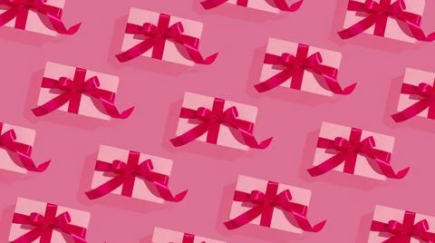 Pattern of gift boxes on pink background Stock Photos