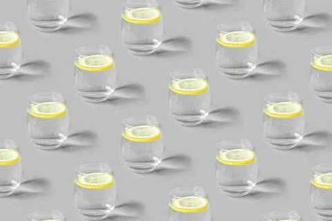 Pattern of glass of lemonade a gray background. Stock Photos