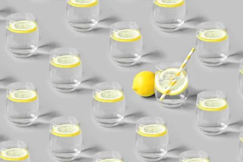 Pattern of glass of lemonade a gray background. Stock Photos