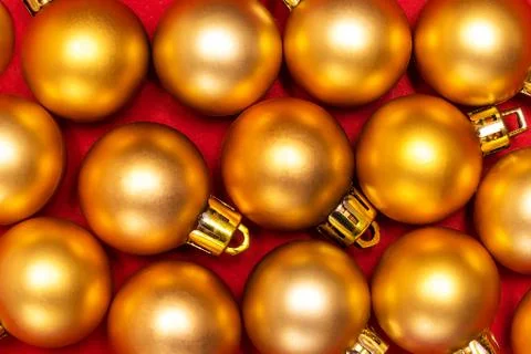 Pattern of gold New Year balls Stock Photos