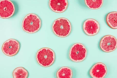 Pattern grapefruit citrus slices pastel backdrop. High quality and resolut... 스톡 사진