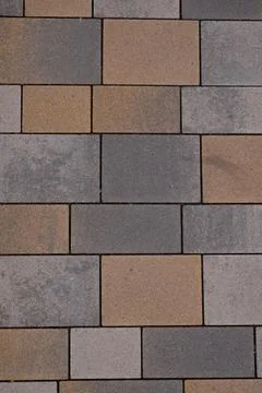 The pattern of gray and beige tiles. Stock Photos