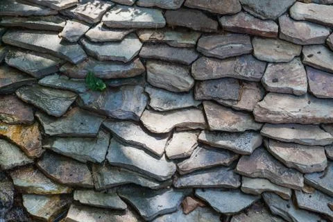 Pattern gray color of modern style design decorative uneven cracked real stone Stock Photos