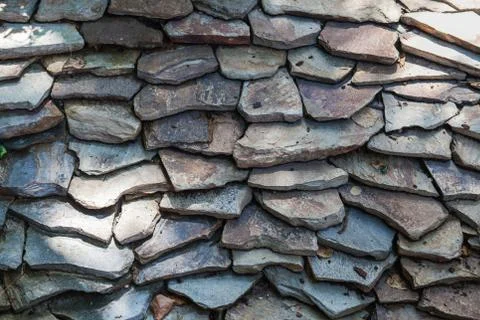 Pattern gray color of modern style design decorative uneven cracked real stone Stock Photos