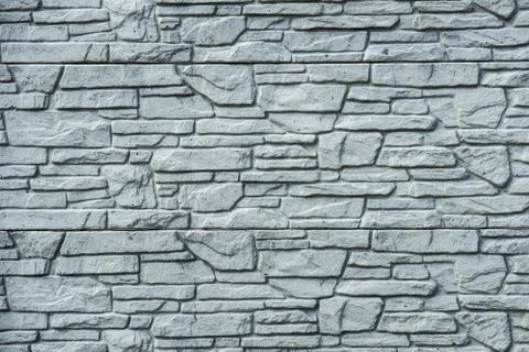 Pattern gray color of modern style design decorative stone wall surface with  Stock Photos
