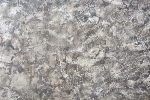 Pattern of gray decorative plaster on the wall Stock Photos