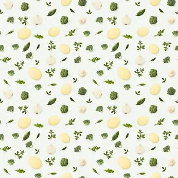 Pattern of green and white leaves and flowers on white background Stock Photos