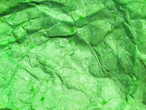 Pattern of green crumpled paper texture background. Stock Photos