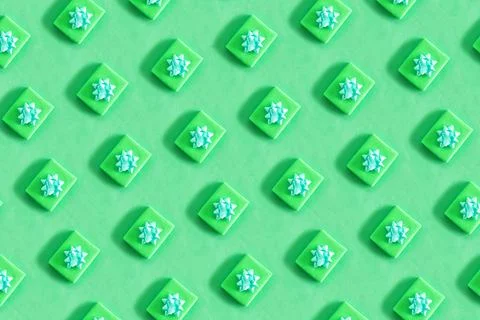 Pattern of green gift boxes on a green background Stock Illustration