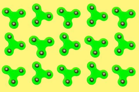 Pattern with a green spinner on a yellow background. Stock Photos