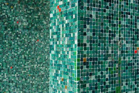 A pattern of green tiles in daylight Stock Photos