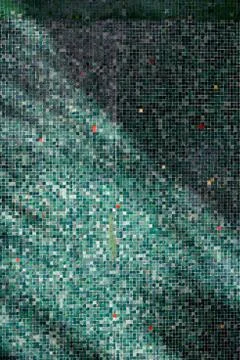 A pattern of green tiles in daylight Stock Photos